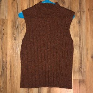 Burnt orange knit turtle neck tank top.
